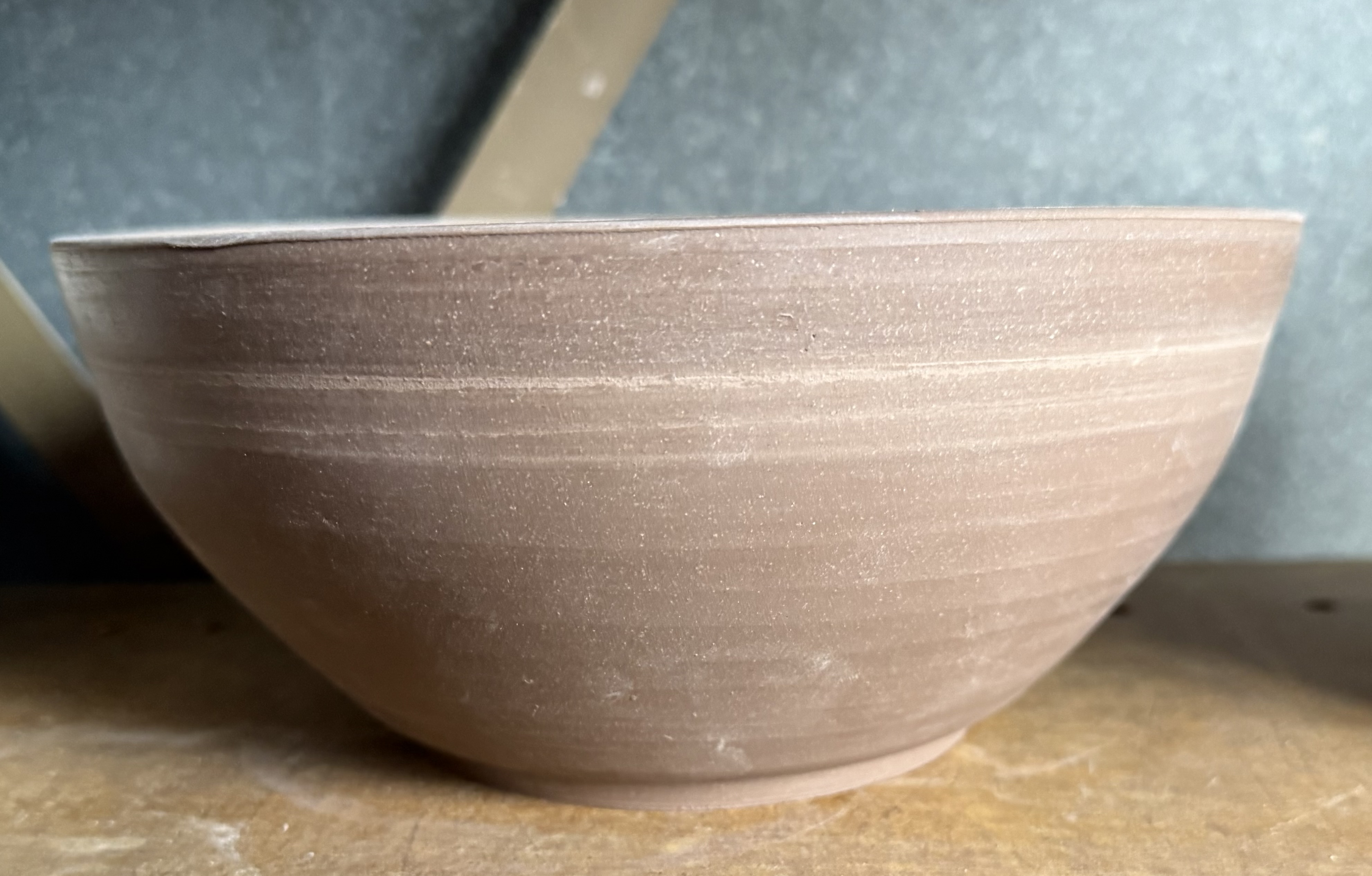 A freshly thrown bowl drying in the studio