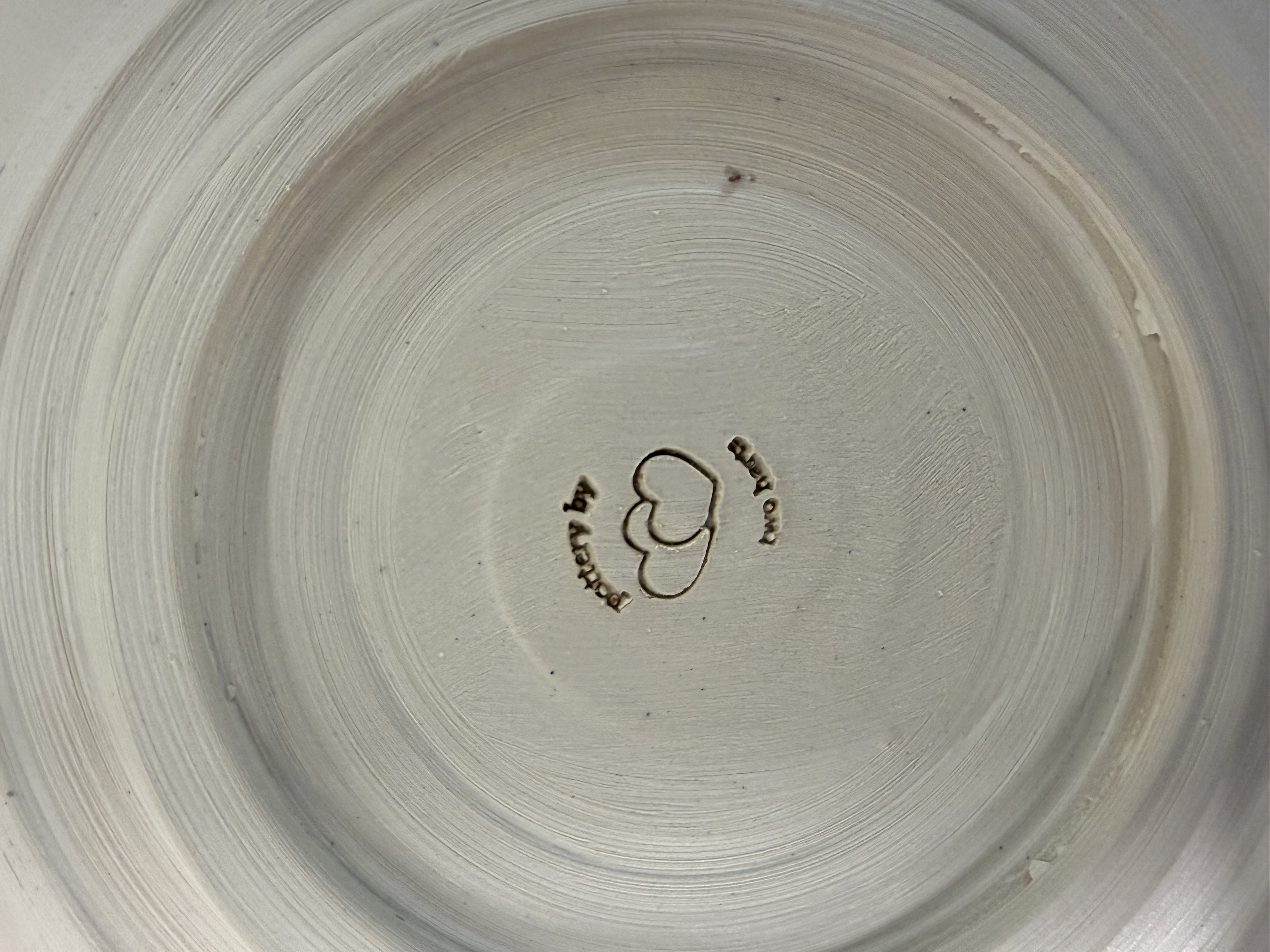 The two harts maker's stamp on the bottom of a piece